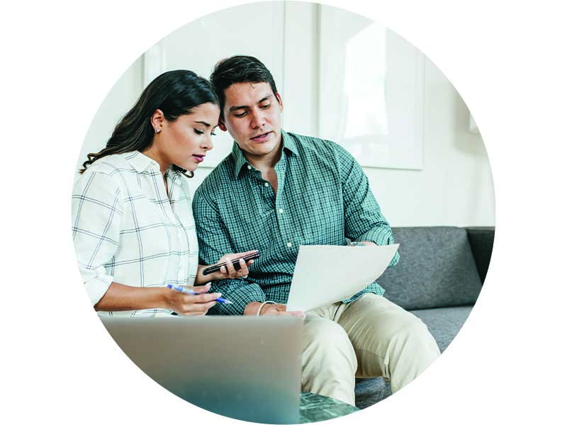 Couple Reviewing Documents for Mortgage